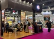Creative exhibition stall decoration ideas showcasing a modern 6x6 exhibition booth design with premium branding, product displays, and visitor engagement at a trade show in 2026.