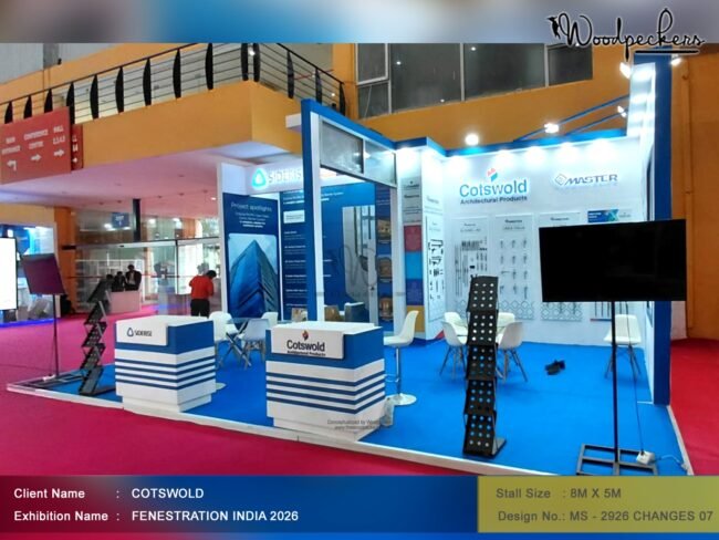 COTSWOLD exhibition stall at Fenestration India 2026 featuring a modern 8m x 5m booth with architectural products, product displays, meeting area, and branded signage.